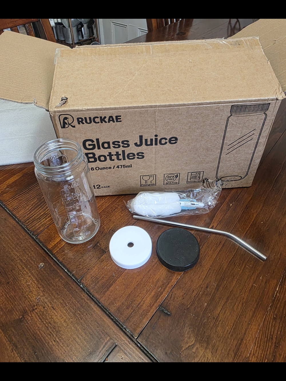 12 Pc Set Clear Glass Juice Bottles with Black Lid and Straw